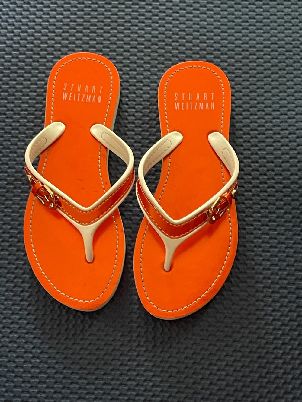 Women’s Stuart Weitzman Bright Orange Leather Thong Sandals with Gold Straps